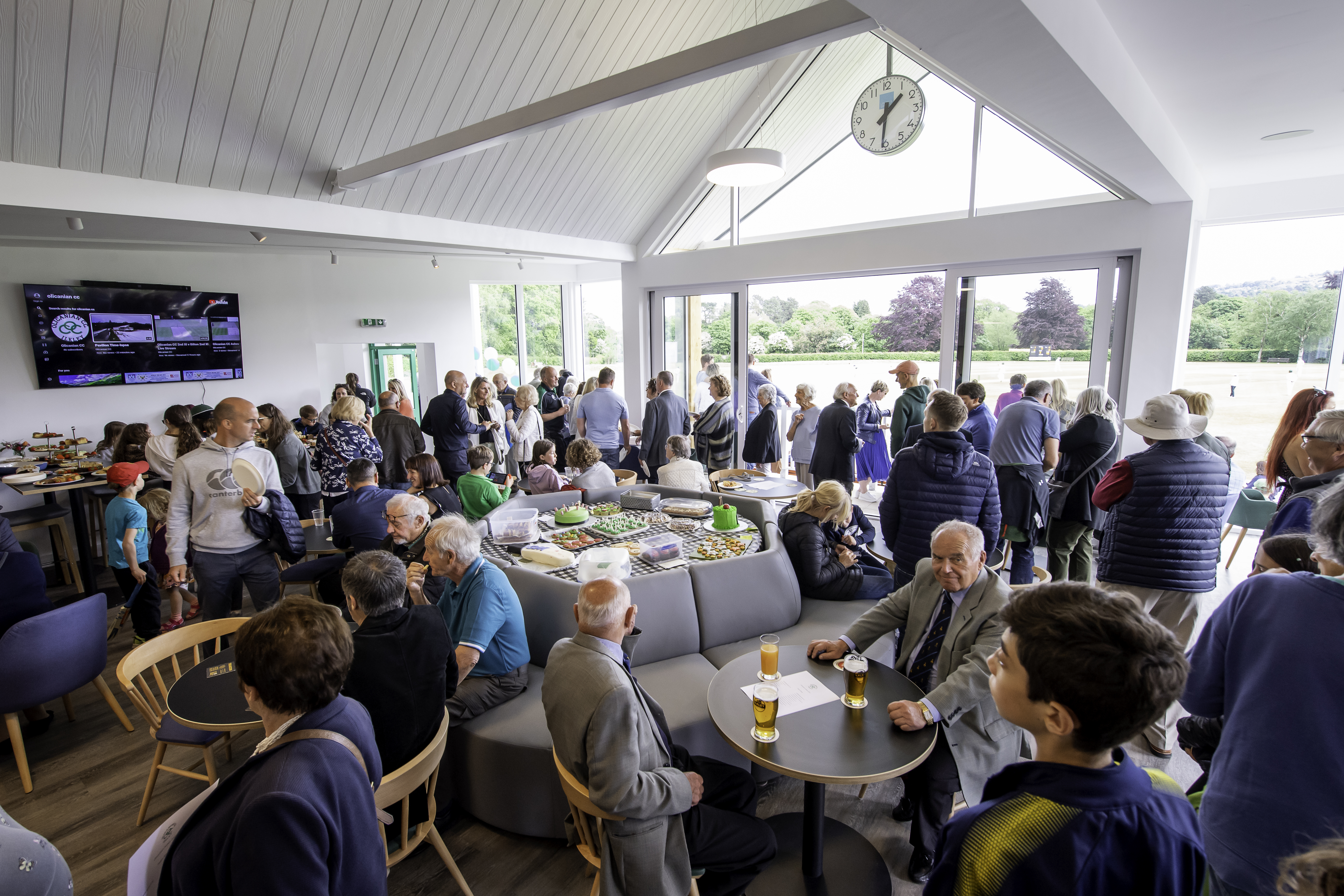 Clubhouse during an event with guests and food tables